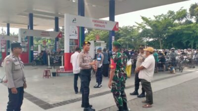 Polsek Pantai Cermin dan Koramil Perkuat Mitigasi Pasca Banjir, Cek Stok BBM di SPBU Celawan