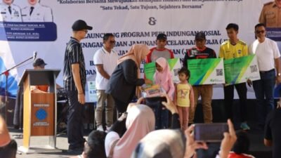 Kuningan Meriah, Wabup Tuti Lepas Jalan Santai dan Launching Program JKK-JKM untuk Pekerja Rentan